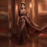 Beautiful Indian Woman in a Flowing Saree of Metallic Texture | prompt for girls college instagram